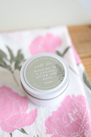 Immerse Yourself in Nature's Embrace Walking In A Garden After The Rain Candle Tin