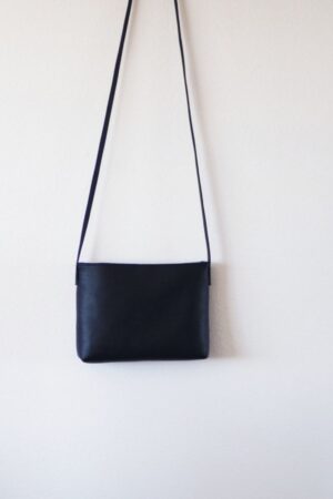 Sleek and Sophisticated The Minimalist Black Leather Crossbody Bag with Magnetic Closure