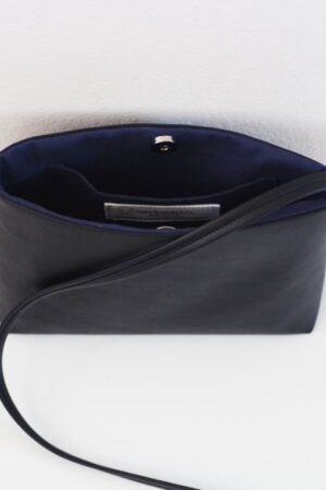 Sleek and Sophisticated The Minimalist Black Leather Crossbody Bag with Magnetic Closure