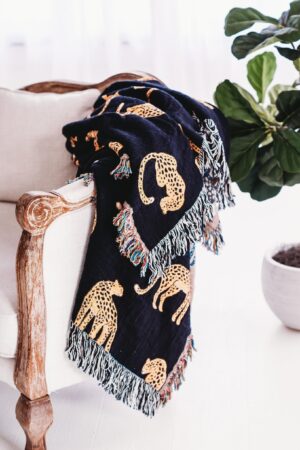 Unleash the Untamed Elegance Luxurious Leopard Throw for a Wildly Chic Home