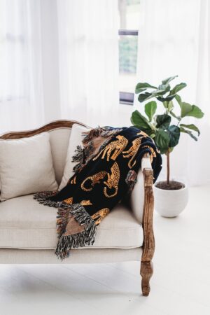 Unleash the Untamed Elegance Luxurious Leopard Throw for a Wildly Chic Home