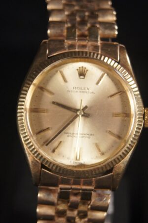 Vintage Rolex Oyster Perpetual A Timeless Treasure in 14K Gold (Circa 1965)