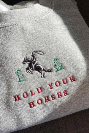 Hold Your Horses Embroidered Western Sweatshirt for the Cowboy Crew