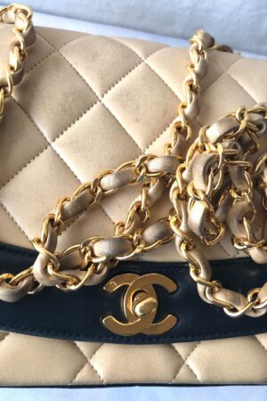 Vintage CHANEL Beige and Black Lambskin 2.55 Classic Flap Shoulder Bag with Golden CC