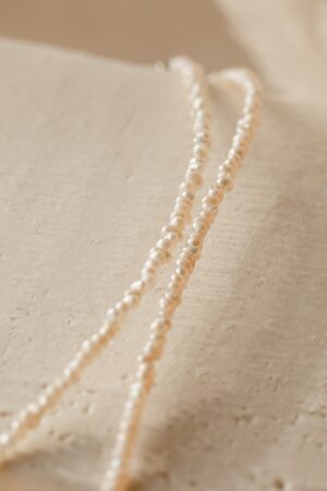 Caitlyn Minimalist's Delicate Pearl Choker A Timeless Adornment for Brides, Bridesmaids, and Special Occasions