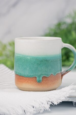 Artisan-Crafted Stoneware Mug An Enchanting Tapestry of White and Green