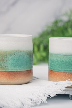 Artisan-Crafted Stoneware Mug An Enchanting Tapestry of White and Green