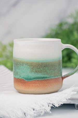 Artisan-Crafted Stoneware Mug An Enchanting Tapestry of White and Green