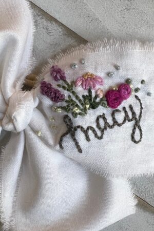 Hand Embroidered Name Bow A Personalized Touch for Special Occasions