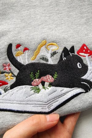 Cozy and Enchanting Embroidered Black Cat and Mushroom Sweatshirt for Cat Lovers