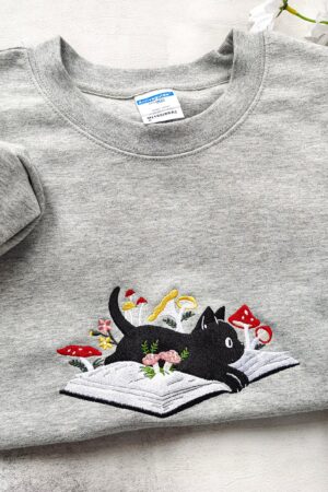 Cozy and Enchanting Embroidered Black Cat and Mushroom Sweatshirt for Cat Lovers