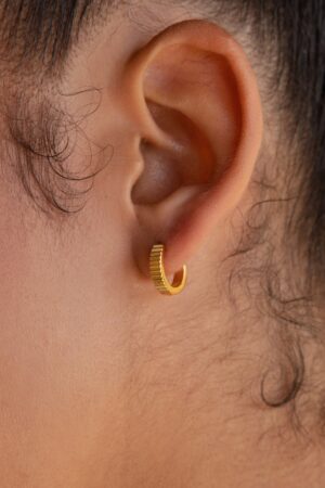 Golden Embrace Ribbed Huggie Hoops for a Timeless Allure