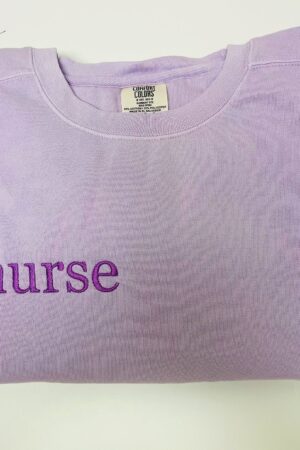 Cozy Comfort for Healthcare Heroes Embroidered Nurse Sweatshirt, Perfect for Graduation and Beyond