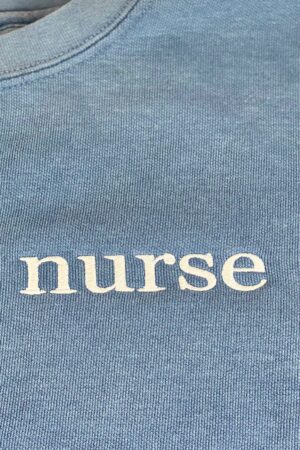 Cozy Comfort for Healthcare Heroes Embroidered Nurse Sweatshirt, Perfect for Graduation and Beyond