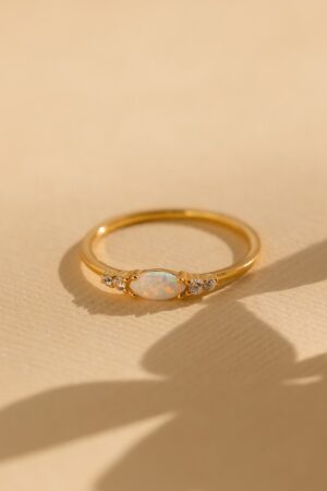 Sparkling Elegance Caitlyn's Opal and Diamond Ring - A Timeless Symbol of Love