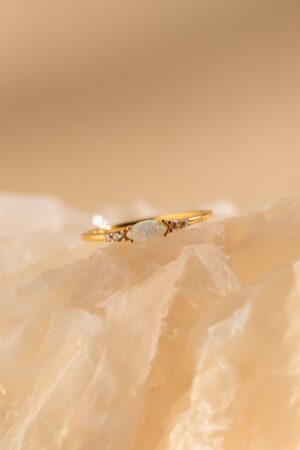 Sparkling Elegance Caitlyn's Opal and Diamond Ring - A Timeless Symbol of Love