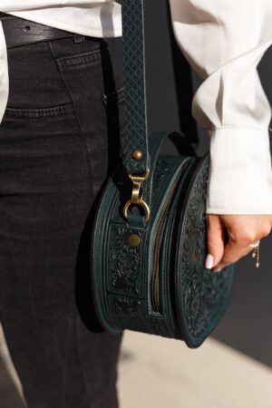 Exquisite Handmade Round Leather Bag with Intricate Flower Embossing