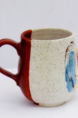 Feathers of Grace Handcrafted Ceramic Mug for an Elegant Touch