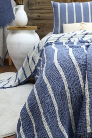 Bohemian Rhapsody Embrace Ethnic Charm with Our Muslin Blanket