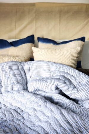 Indulge in Tranquil Slumber Cozy Haven's Velvet Quilt, Voile Runner, and Soft Throw