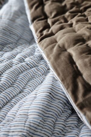 Indulge in Tranquil Slumber Cozy Haven's Velvet Quilt, Voile Runner, and Soft Throw