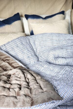 Indulge in Tranquil Slumber Cozy Haven's Velvet Quilt, Voile Runner, and Soft Throw