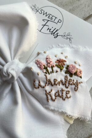 Hand Embroidered Name Bow A Personalized Touch for Special Occasions