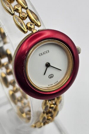 Vintage Gucci Interchangeable Bezel Watch with Rice Links Bracelet in Gold Tone A Timeless Treasure from the 90s