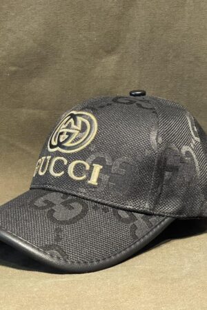 Gucci Vintage Black Cap A Timeless Monogrammed Masterpiece