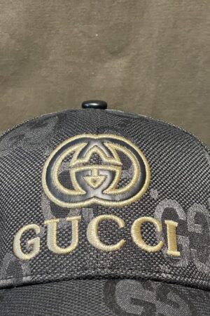 Gucci Vintage Black Cap A Timeless Monogrammed Masterpiece