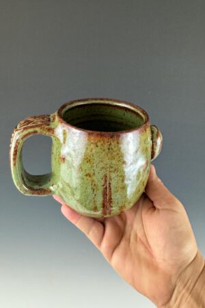 Handmade Masterpiece Elevate Your Daily Brew with Our Unique Pottery Mug