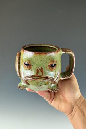 Handmade Masterpiece Elevate Your Daily Brew with Our Unique Pottery Mug