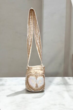 Best-Selling Wayuu Bucket Bag Handcrafted Colombian Crossbody Purse with Intricate White Cross Design