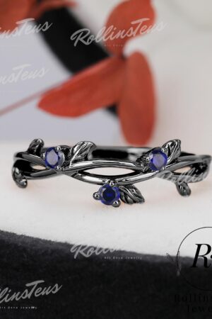 Nature's Embrace Blue Sapphire and Black Gold Twig Ring, a Symbol of Love and Growth