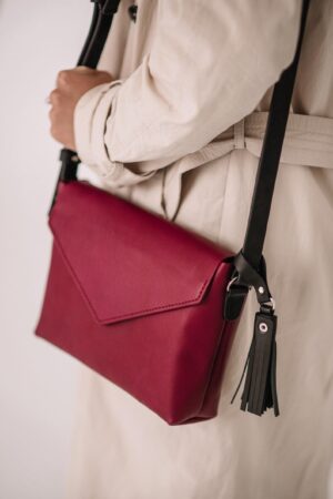 Chic and Versatile Bordo Leather Crossbody Bag with Hanging Toiletry Pouch