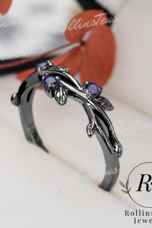 Nature's Embrace Blue Sapphire and Black Gold Twig Ring, a Symbol of Love and Growth