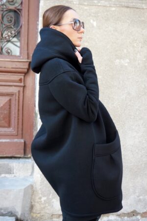 Luxurious Asymmetrical Black Hooded Coat Warmth, Style, and Functionality